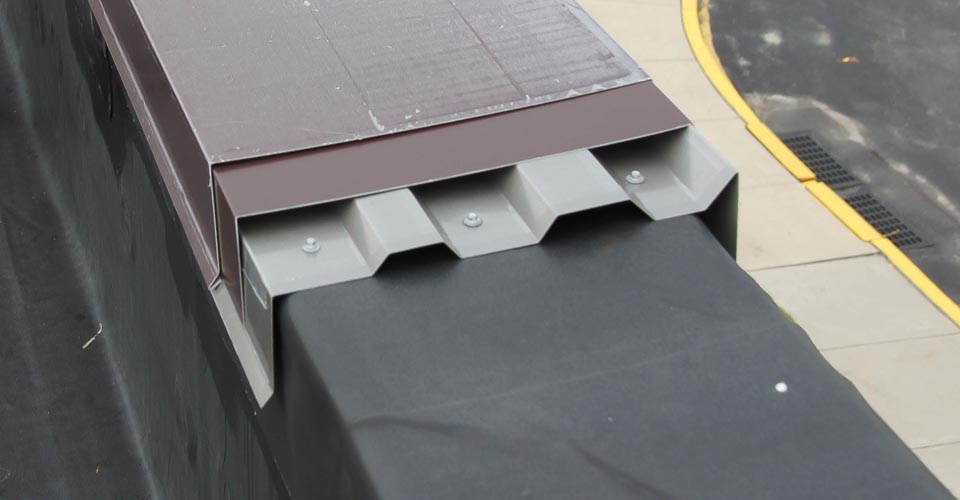 Metal coping. The picture shows a close up frame of snap lock metal coping.